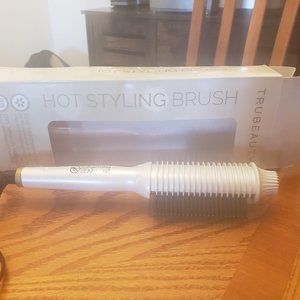 Women's curling iron (brand new)